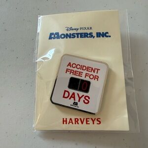Harveys Monsters, Inc. "Accident Free For 0 Days" White and Red Enamel Brooch